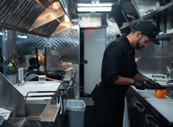 Inside of a street food truck kitchen Photo by RODNAE Productions from Pexels