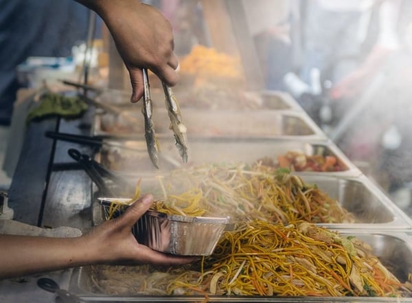 Street food serving up noodles from truck_Photo by James Sutton on Unsplash