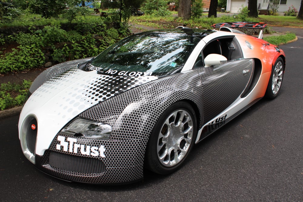 Bugatti-Veyron-Gumball-3000-Rally-Supercar-Hypercar-Wrap-Raccoon