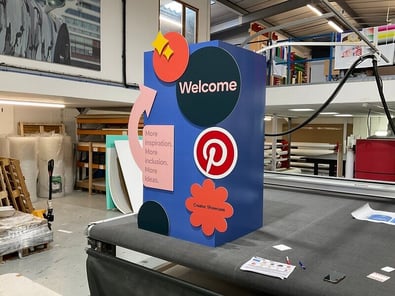 A re-board display, in Raccoon, which is a large format printing company. Pictured inside the workshop.