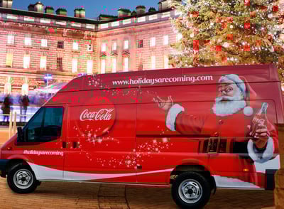 A simple yet elegant vehicle wrap design for Coca Cola at Christmas, featuring Santa.