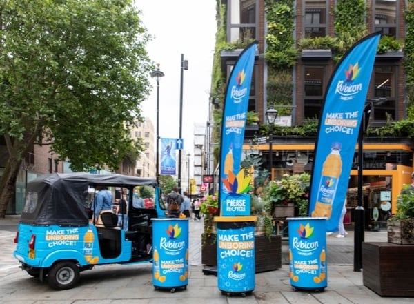 Custom large format print tuk tuk wrap, promo counters and flags