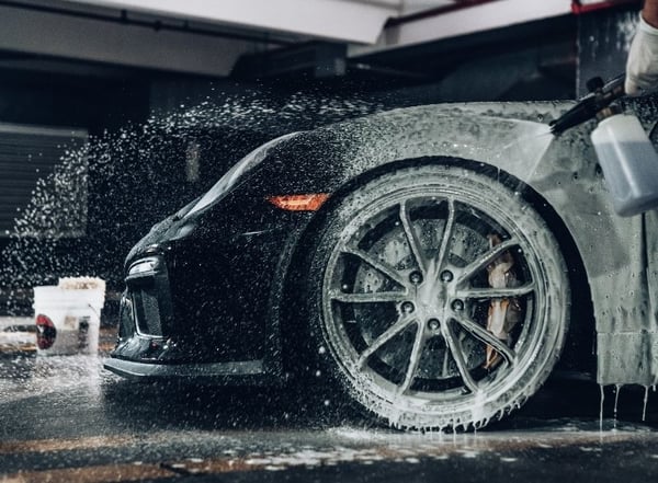 Vehicle wrap aftercare: Handwashing sports car wrap - credit Andre Tan from Unsplash