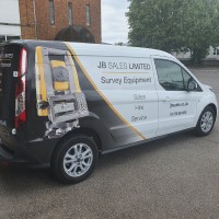 JB-Sales-Ford-Transit-Connect-Partial-Graphics-White-Black- Raccoon