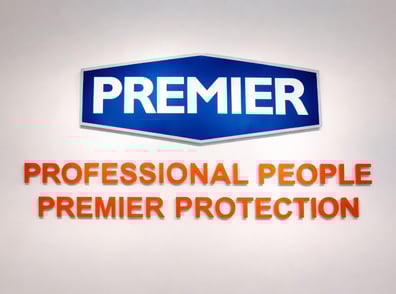 Interior signage inside the Premier Alarms showroom.