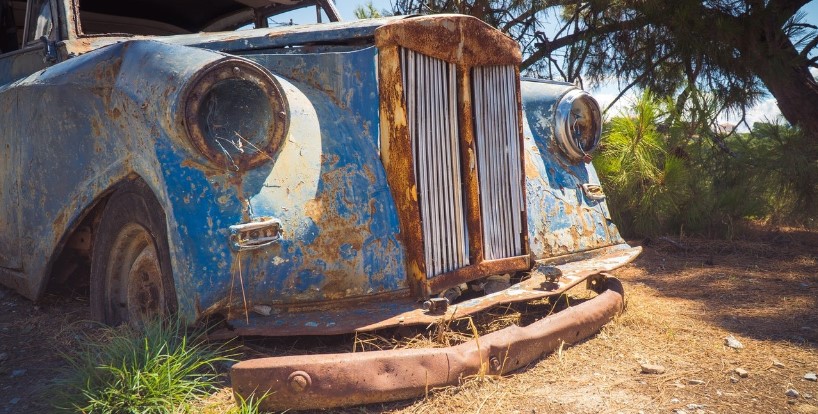 A blue rusted vehicle