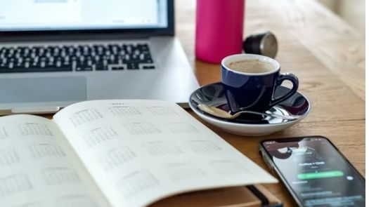 Food truck calendar_calendar with empty coffee cup and pen