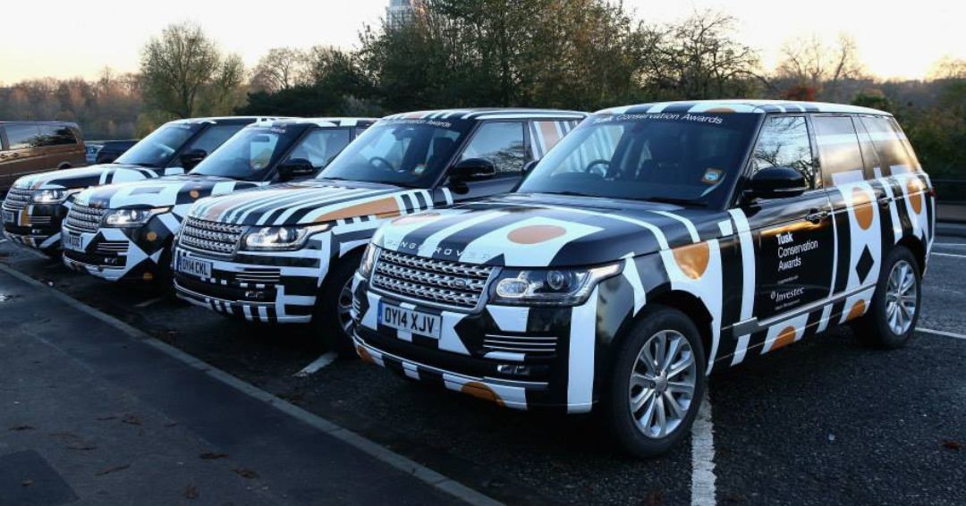 Investec fleet wrap vehicle branding graphics black white brown