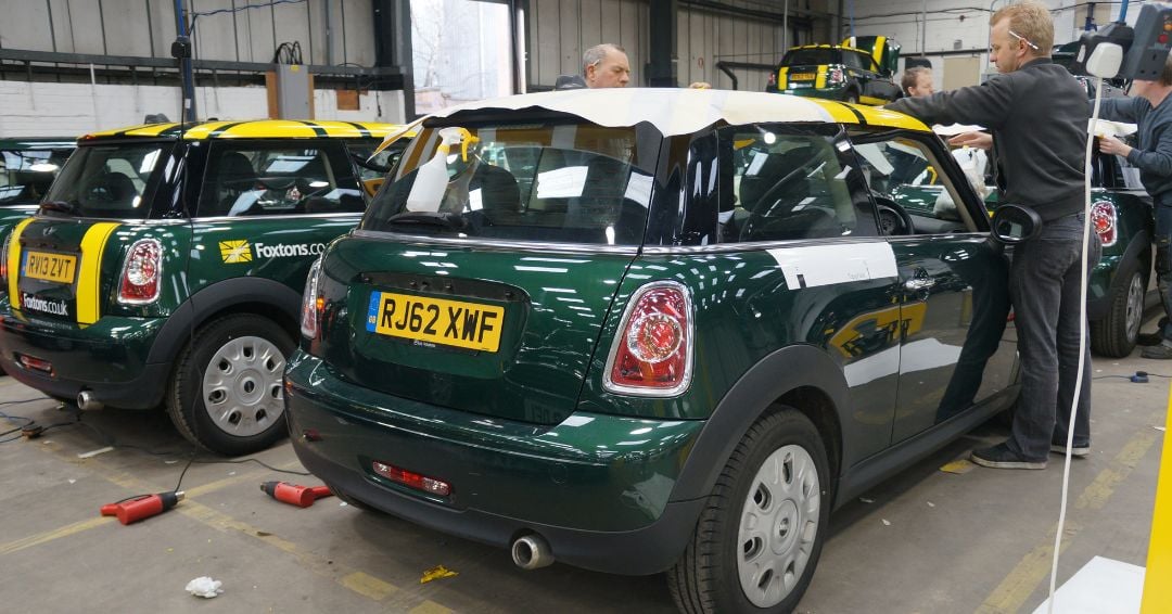 Foxtons mini fleet offsite wrapping at Foxtons Operational HQ