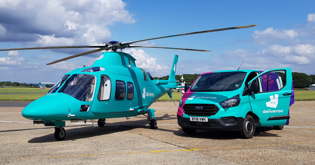 A wrapped van and helicopter from a reliable car wrapping company.